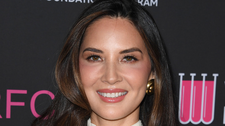 Olivia Munn smiling red carpet