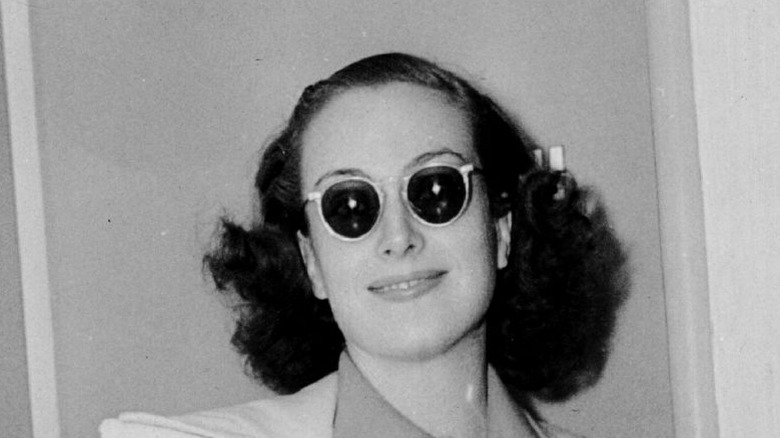 Joan Crawford wearing sunglasses