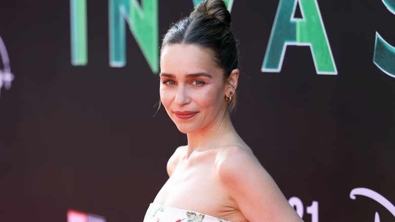 Emilia Clarke smiling on red carpet