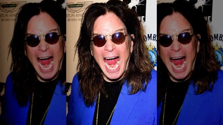 Ozzy Osbourne with sunglasses on, screaming