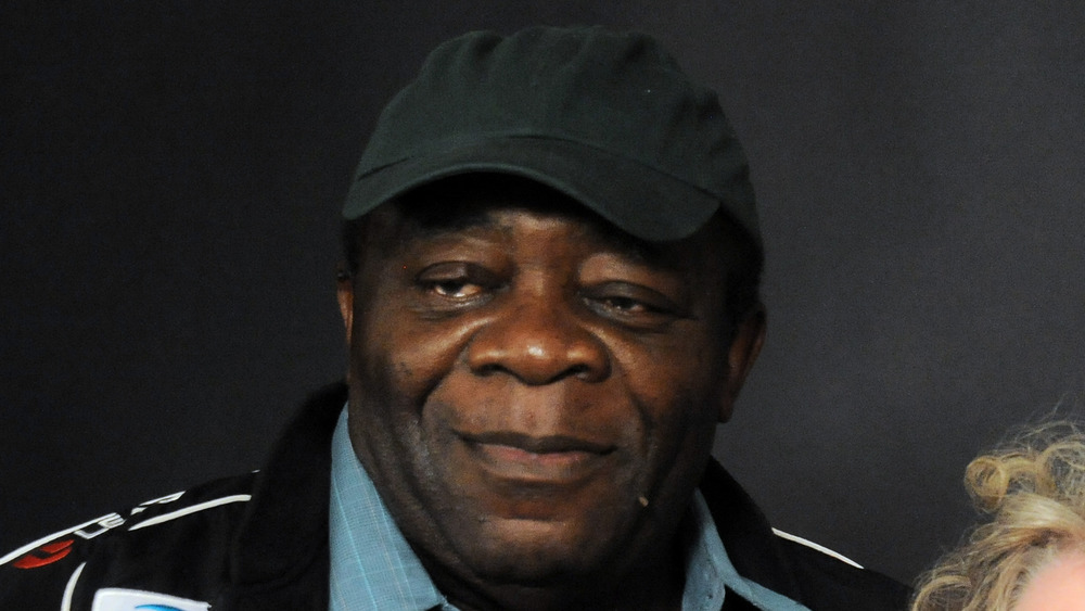 Yaphet Kotto in black baseball cap
