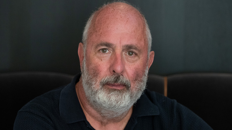 Roger Michell looking at camera