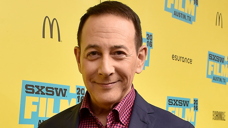 Paul Reubens navy suit