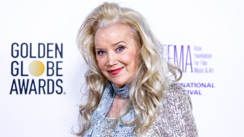 Sally Kirkland posing at the Golden Globes.