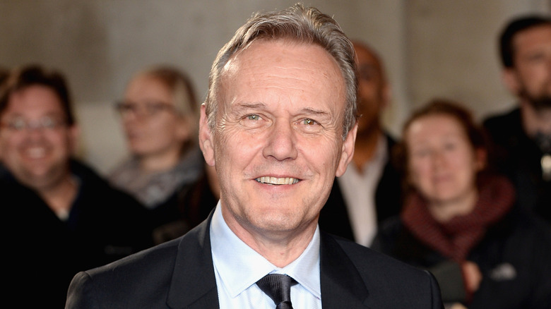 Anthony Head posing on the red carpet
