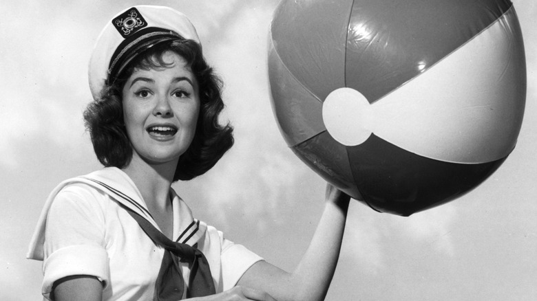 Shelley Fabares posing with a beach ball in the 1960s