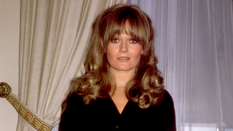 Valerie Perrine posing