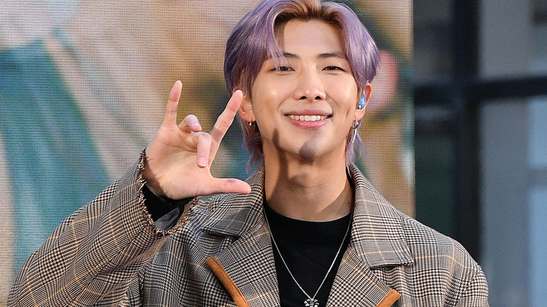 Kim Namjoon smiling on stage