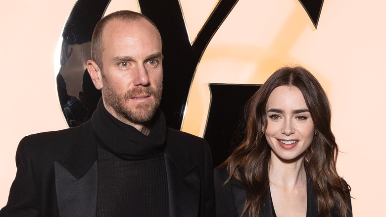 Charlie McDowell and Lily Collins posing