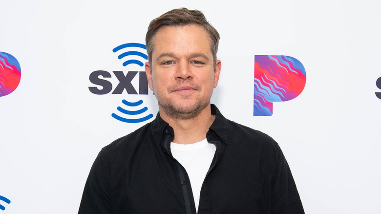 Matt Damon posing for photos