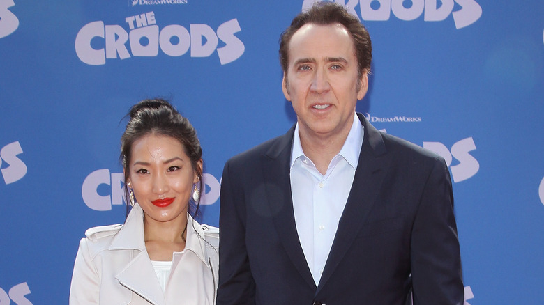 Nicolas Cage and Alice Kim smiling