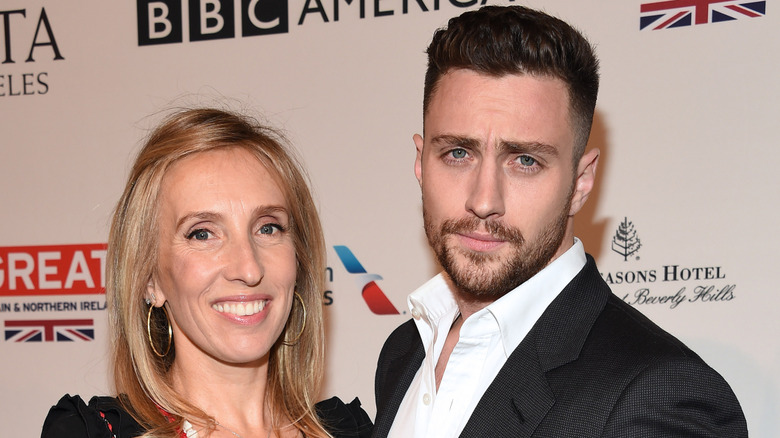 Aaron Taylor-Johnson and Sam Taylor-Johnson posing at an event