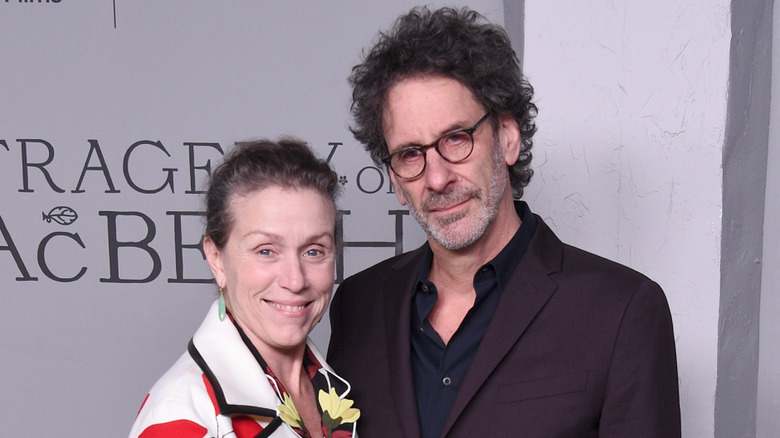 Frances McDormand and Joel Coen smiling together