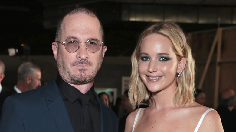 Darren Aronofsky and Jennifer Lawrence posing at an event