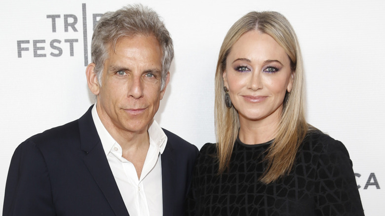 Christine Taylor and Ben Stiller posing on a red carpet