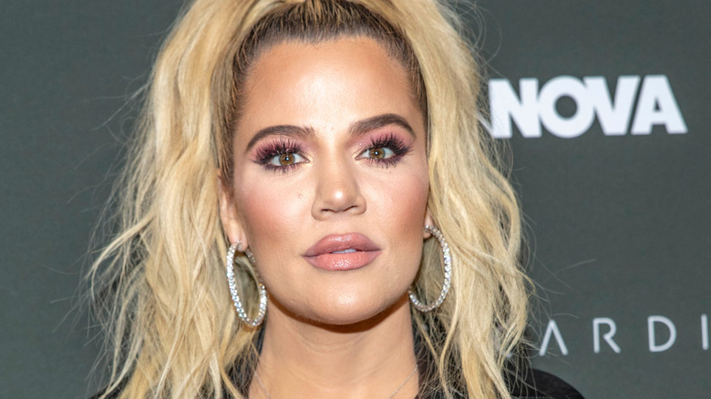 Khloe Kardashian wears hoops