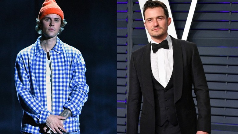 Justin Bieber and Orlando Bloom frowning
