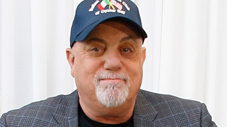 Billy Joel posing for a photo