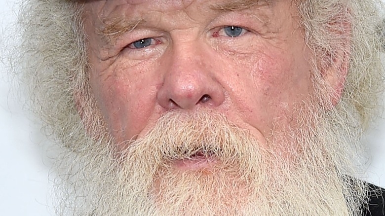 Nick Nolte posing for photos