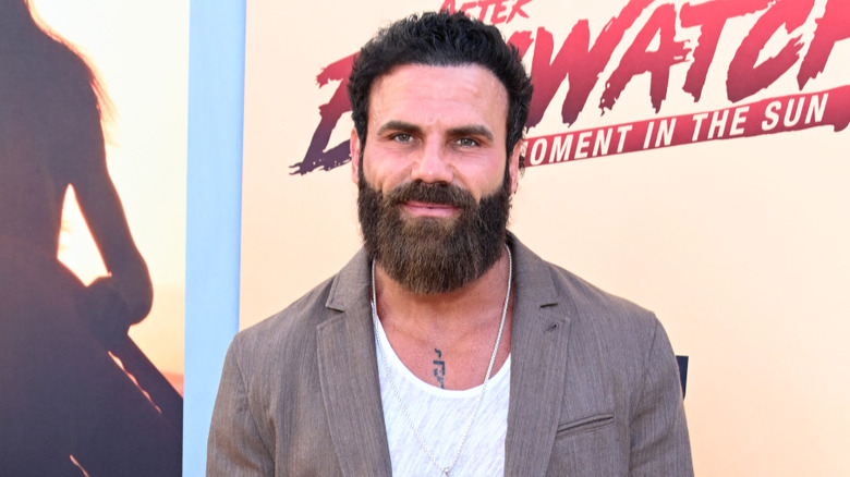 Jeremy Jackson posing at the "After Baywatch: Moment in the Sun" premiere