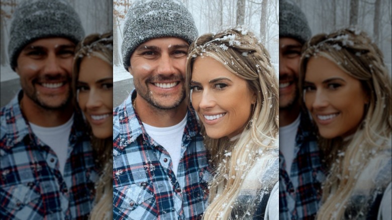 Joshua and Christina Hall taking a snowy selfie
