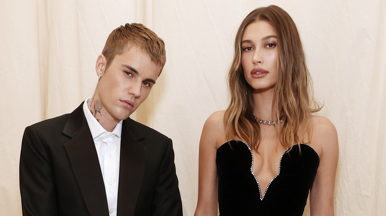 Justin Bieber in a suit, Hailey Bieber wearing a strapless dress