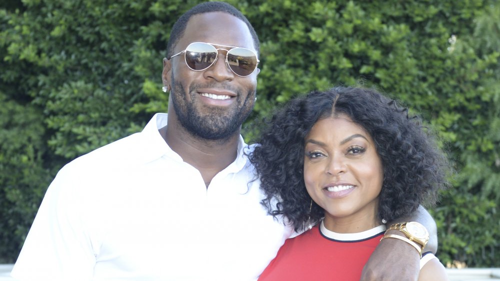 Taraji P. Henson and Kelvin Hayden wearing sunglasses