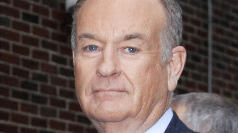 Bill O'Reilly wearing a blue suit