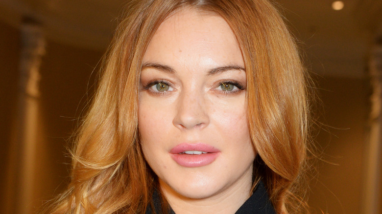 Lindsay Lohan attends The 59th Women of the Year Lunch