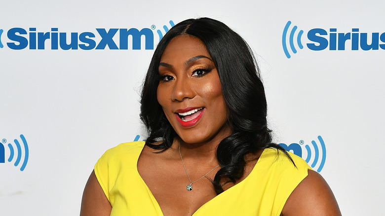 Towanda Braxton yellow dress