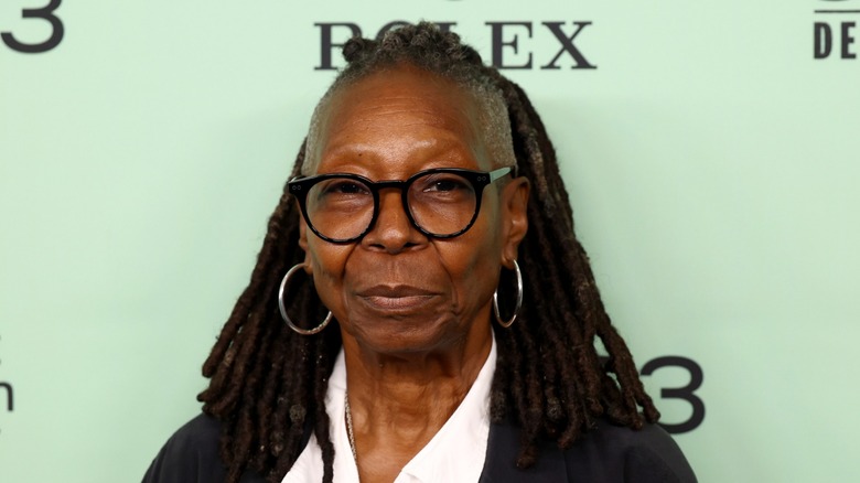 Comedian/talk show host Whoopi Goldberg poses on the red carpet