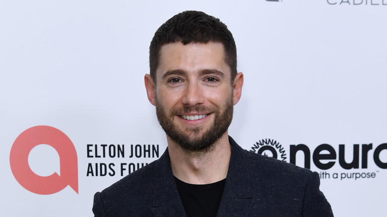 Julian Morris posing at an event