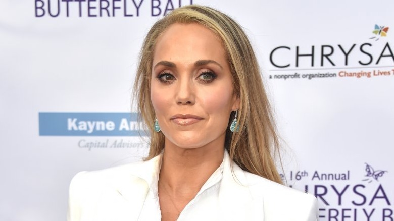 Elizabeth Berkley posing
