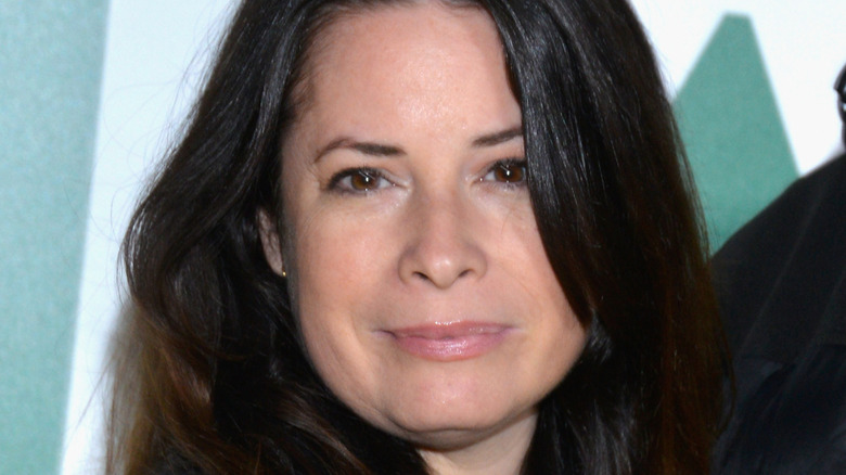 Holly Marie Combs posing with a neutral expression