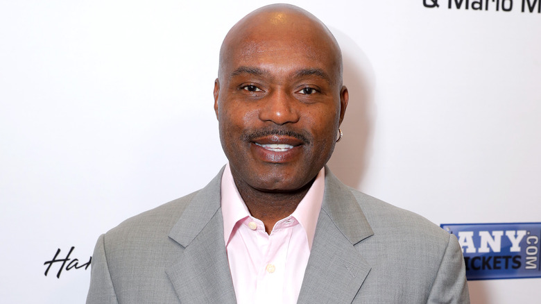 Tim Hardaway posing at event