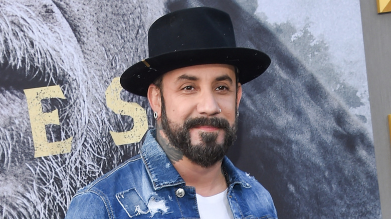 AJ McLean wearing a hat