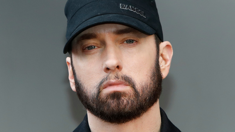 Eminem wearing a hat
