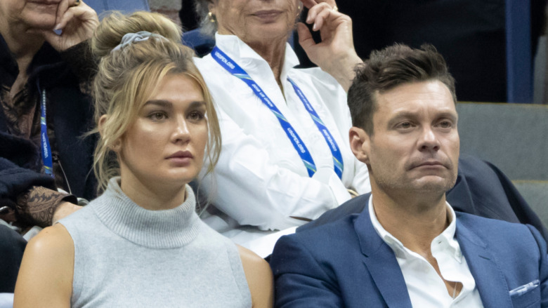 Ryan Seacrest and Shayna Taylor sitting together