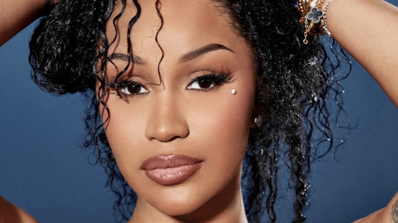 Cardi B in a promotional photo for her company, Grow Good Beauty