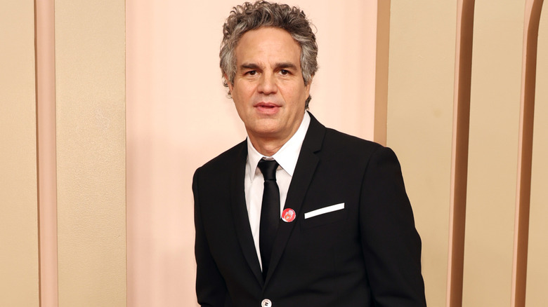 Mark Ruffalo posing in front of a beige background