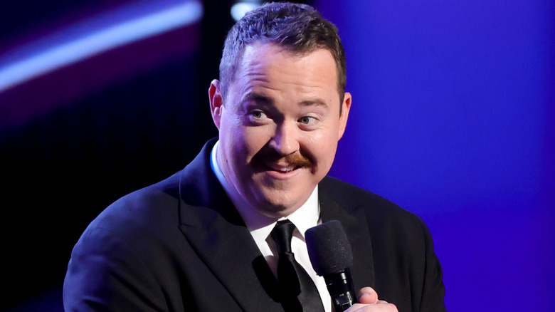 Shane Gillis holding a microphone while hosting the 2025 ESPY Awards