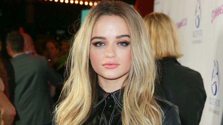 Joey King posing at event in 2018