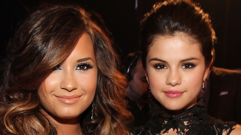 Selena Gomez and Demi Lovato at an event