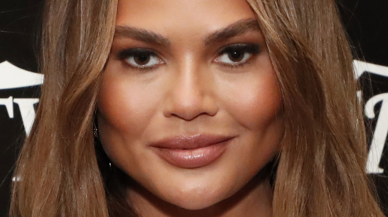 Chrissy Teigen straight face 