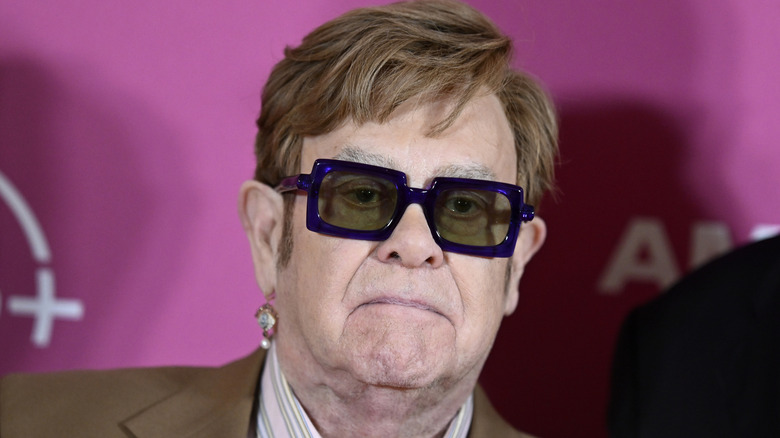 Elton John posing