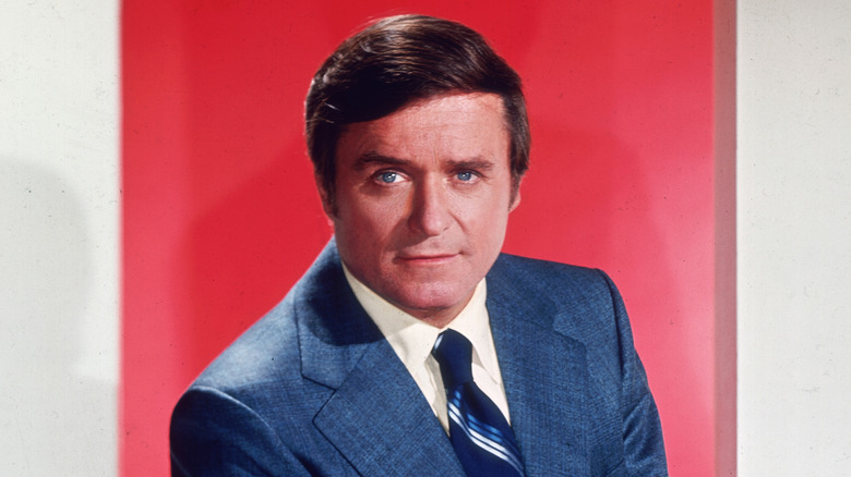 Mike Douglas sitting