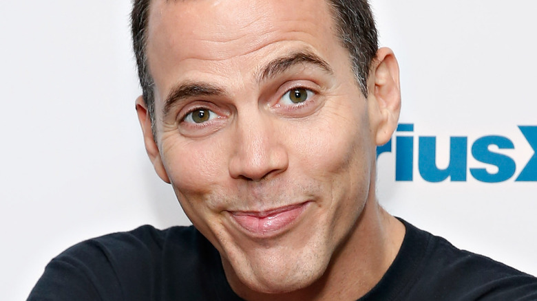 Steve O smirking