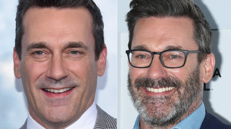 Jon Hamm smily while bearded on the red carpet