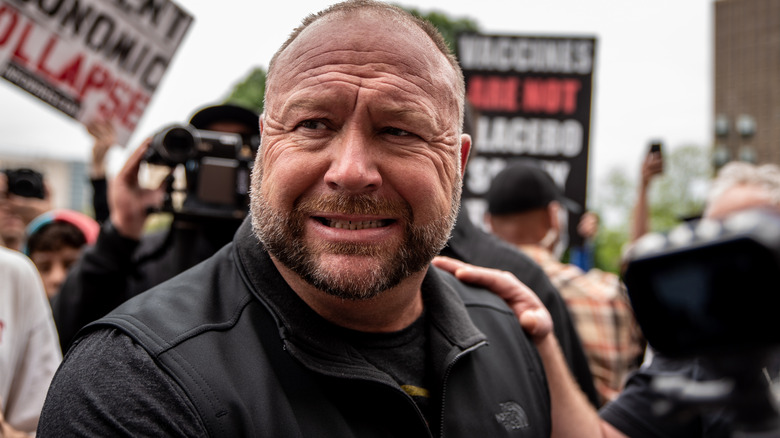 Alex Jones grimacing 