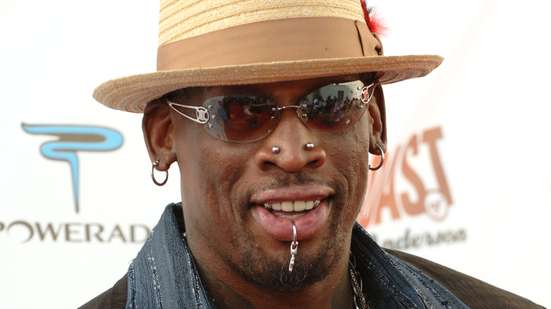Dennis Rodman poses for a photo